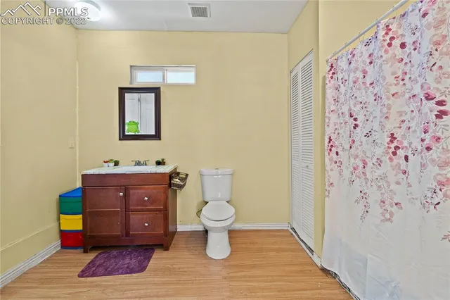 a bathroom with a sink and a toilet