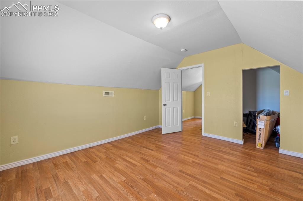 5025 Lauppe Road Yoder, CO 80864 - Photo 29 of 50 a view of empty room with wooden floor