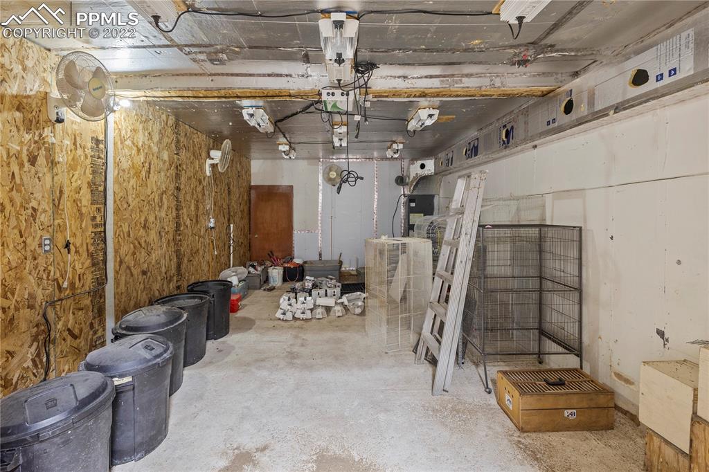 5025 Lauppe Road Yoder, CO 80864 - Photo 41 of 50 a view of a room with gym equipment