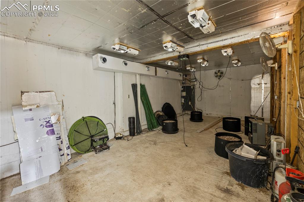 5025 Lauppe Road Yoder, CO 80864 - Photo 42 of 50 a view of a room with gym equipment