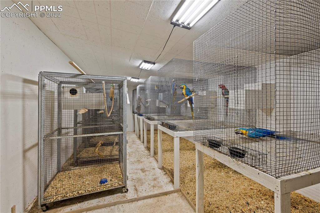 5025 Lauppe Road Yoder, CO 80864 - Photo 44 of 50 a kitchen with counter top space and stainless steel appliances