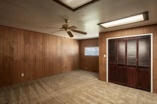a view of a workspace with furniture
