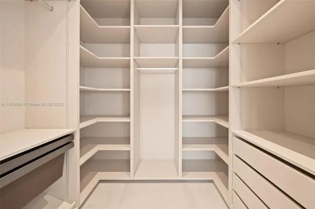 a spacious bathroom with a bathtub and a shower