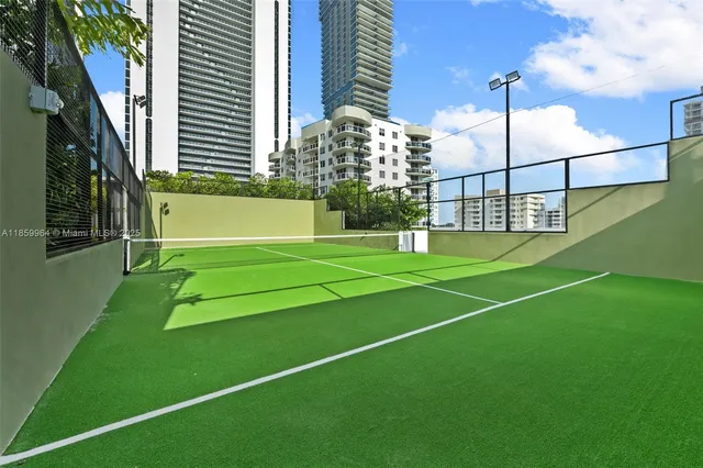 a view of a chairs and table in a patio
