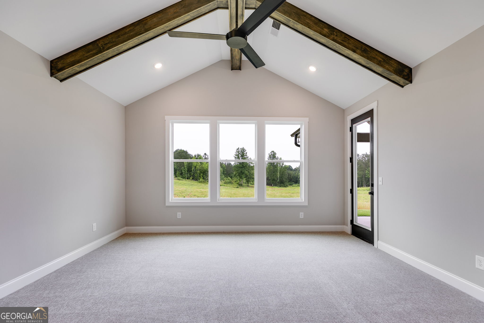 1611 Bethesda Church Road Carrollton, GA 30117 - Photo 18 of 45 a view of an empty room with a window