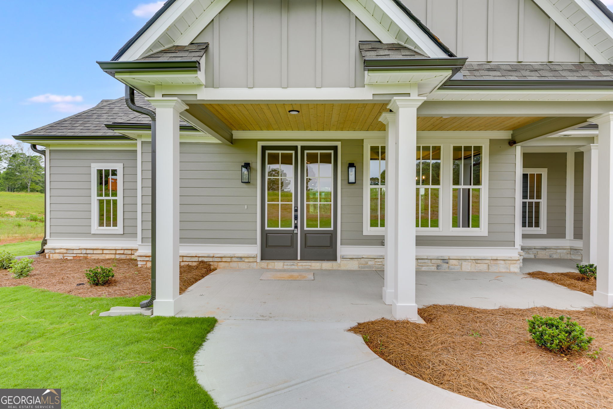 1611 Bethesda Church Road Carrollton, GA 30117 - Photo 2 of 45 a front view of a house with garden