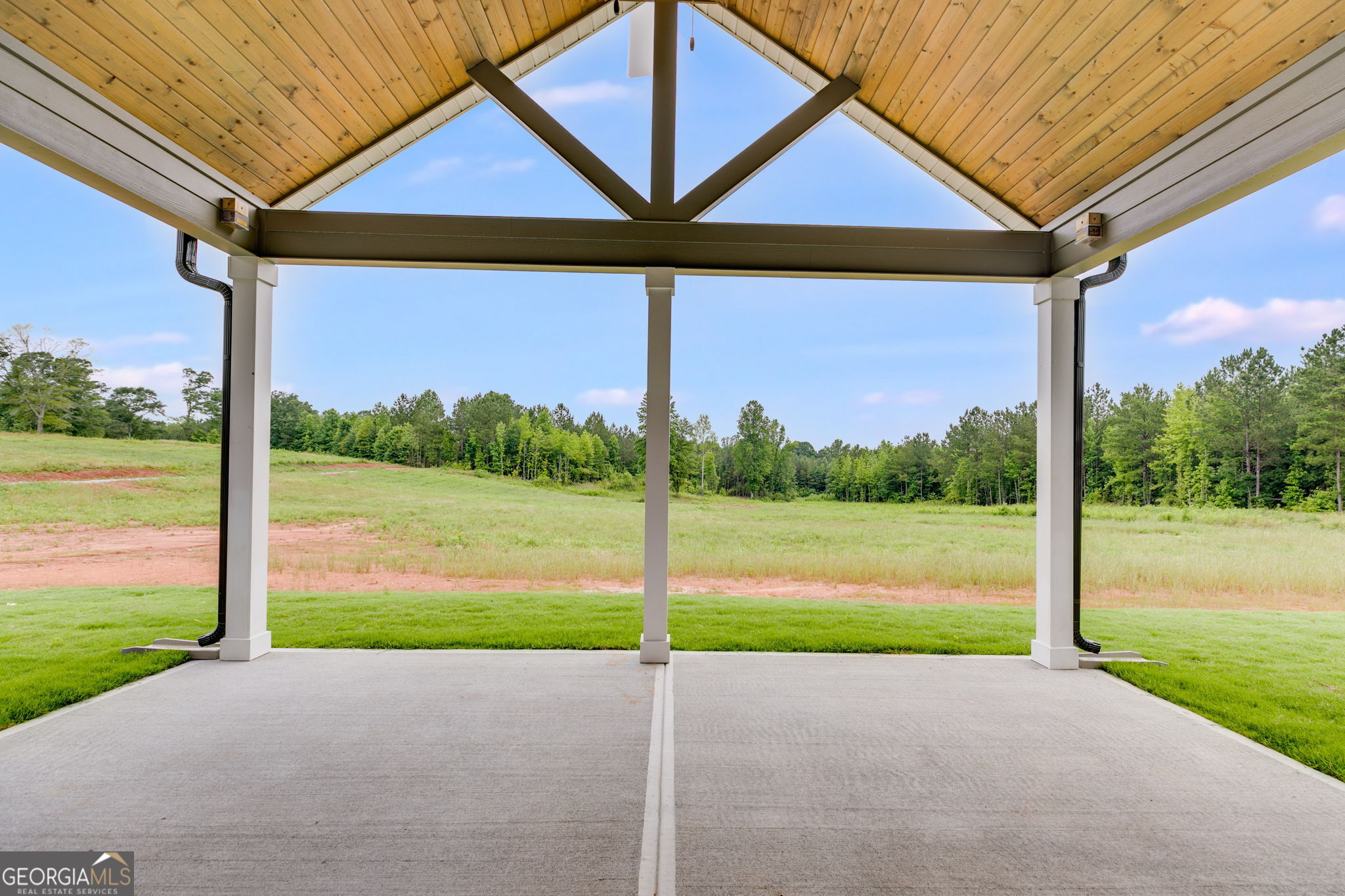 1611 Bethesda Church Road Carrollton, GA 30117 - Photo 39 of 45 a view of a house with backyard and porch