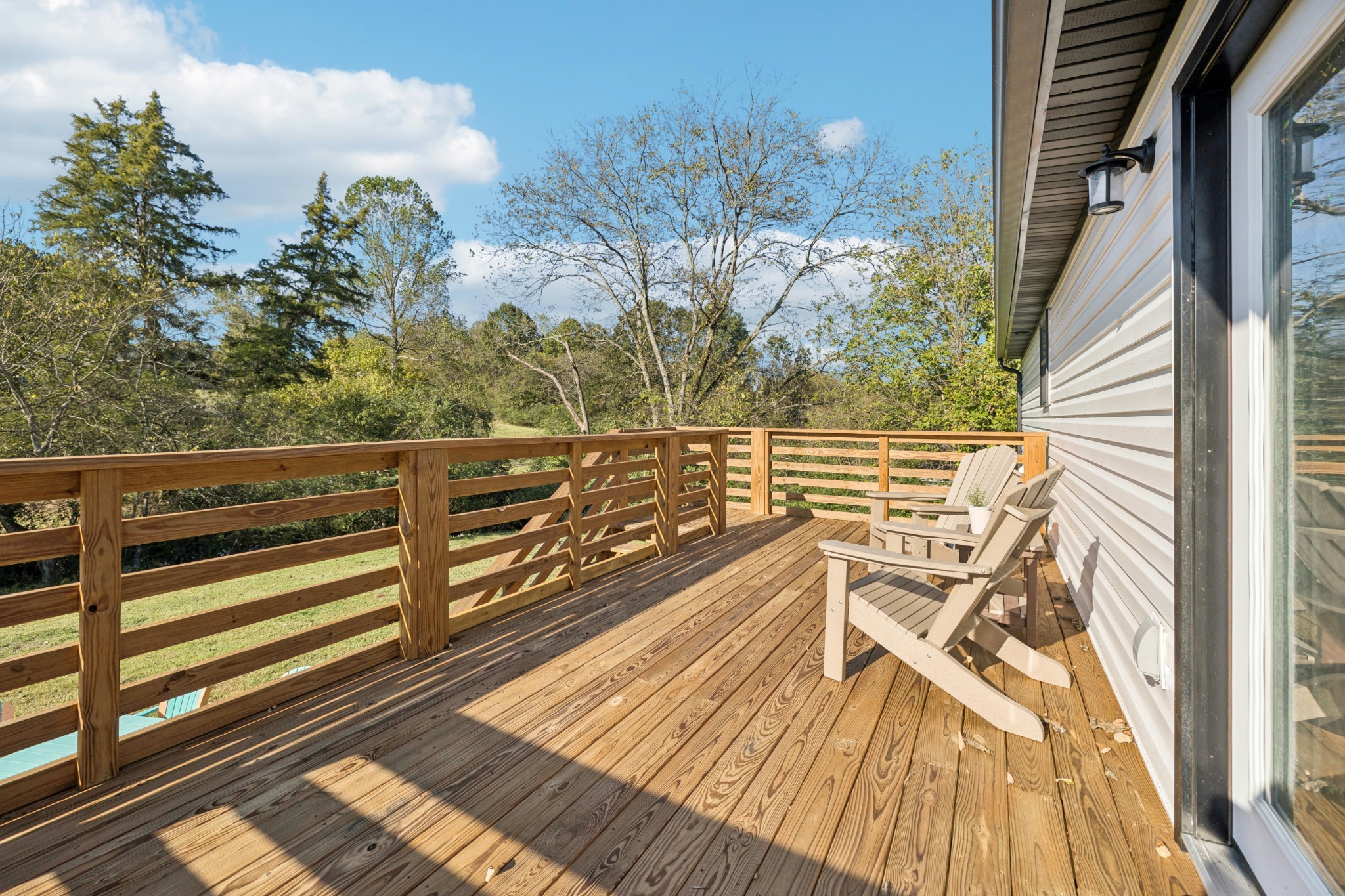 417 Defeated Creek Highway Carthage, TN 37030 - Photo 29 of 31 a view of a balcony with wooden floor and fence