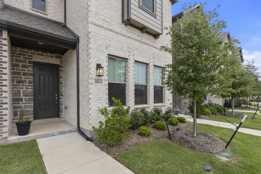 3014 Opera Way Sachse, TX 75048 - Photo 4 of 34 Welcoming entrance with great curb appeal. HOA takes care of the lawn, landscaping and all exterior building maintenance!