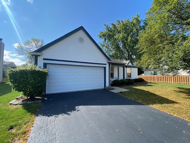 655 Equestrian Drive Wheeling, IL 60090 - Photo 1 of 3 a view of backyard of the house