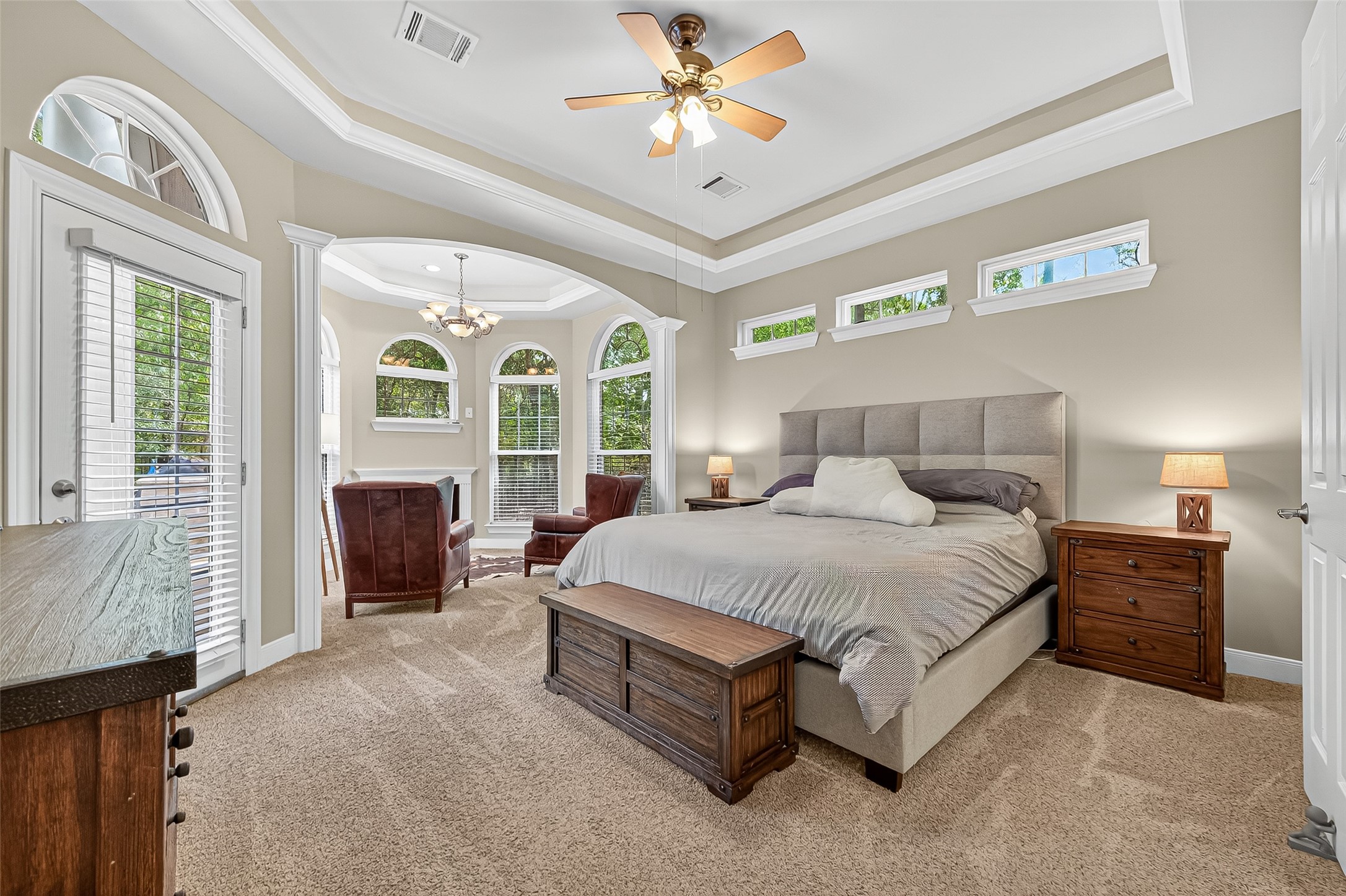 32819 Whitburn Trail Fulshear, TX 77441 - Photo 17 of 49 a spacious bedroom with a bed and glass door