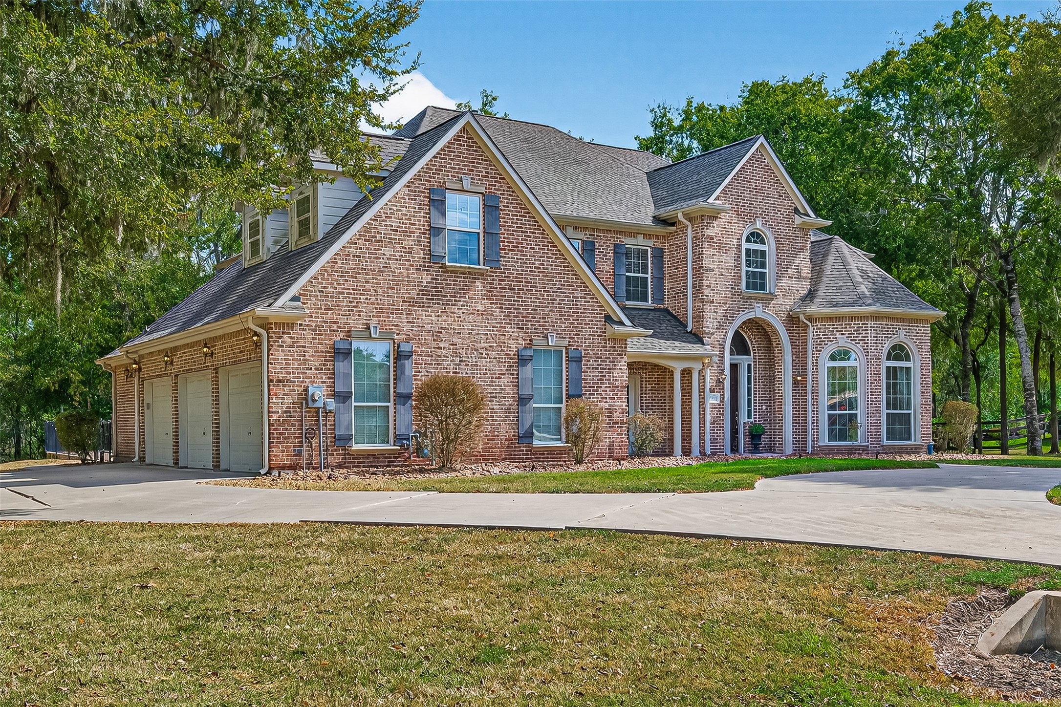 32819 Whitburn Trail Fulshear, TX 77441 - Photo 2 of 49 a front view of a house with a yard