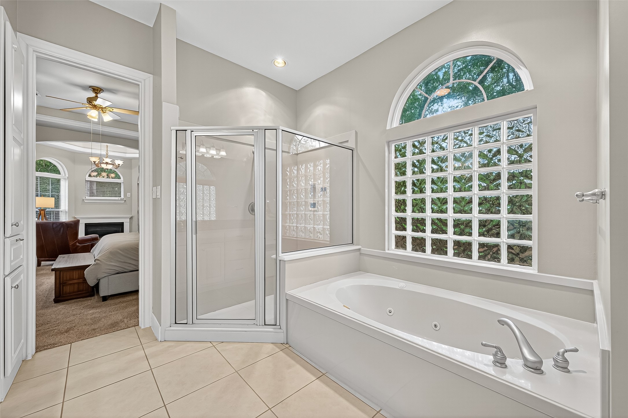 32819 Whitburn Trail Fulshear, TX 77441 - Photo 21 of 49 a spacious bathroom with a tub shower and a sink