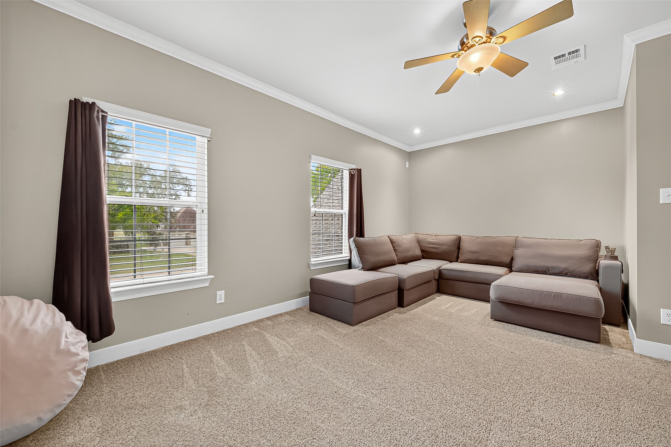 32819 Whitburn Trail Fulshear, TX 77441 - Photo 23 of 49 a living room with furniture and a window