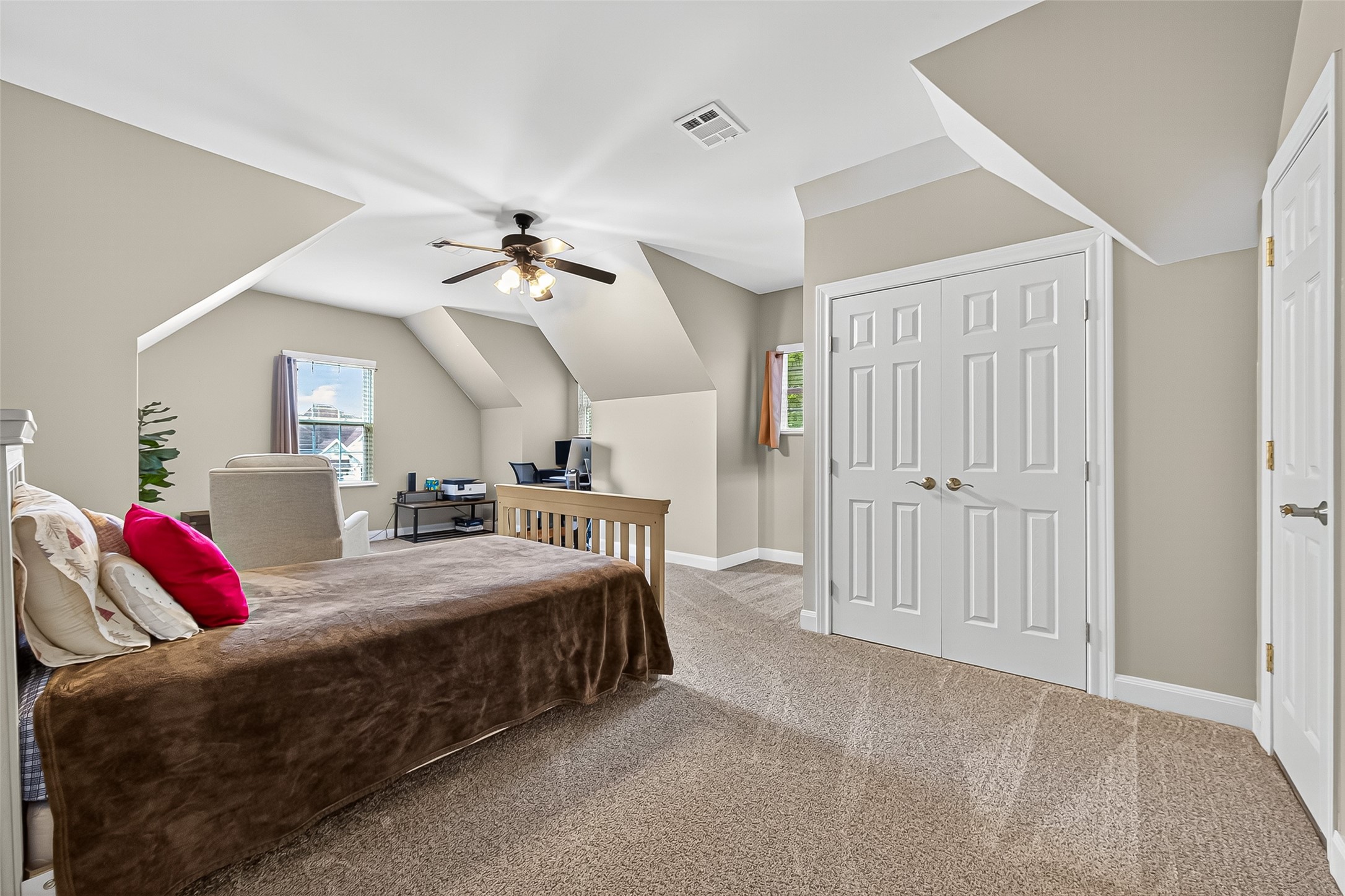 32819 Whitburn Trail Fulshear, TX 77441 - Photo 25 of 49 a bedroom with a bed and a ceiling fan