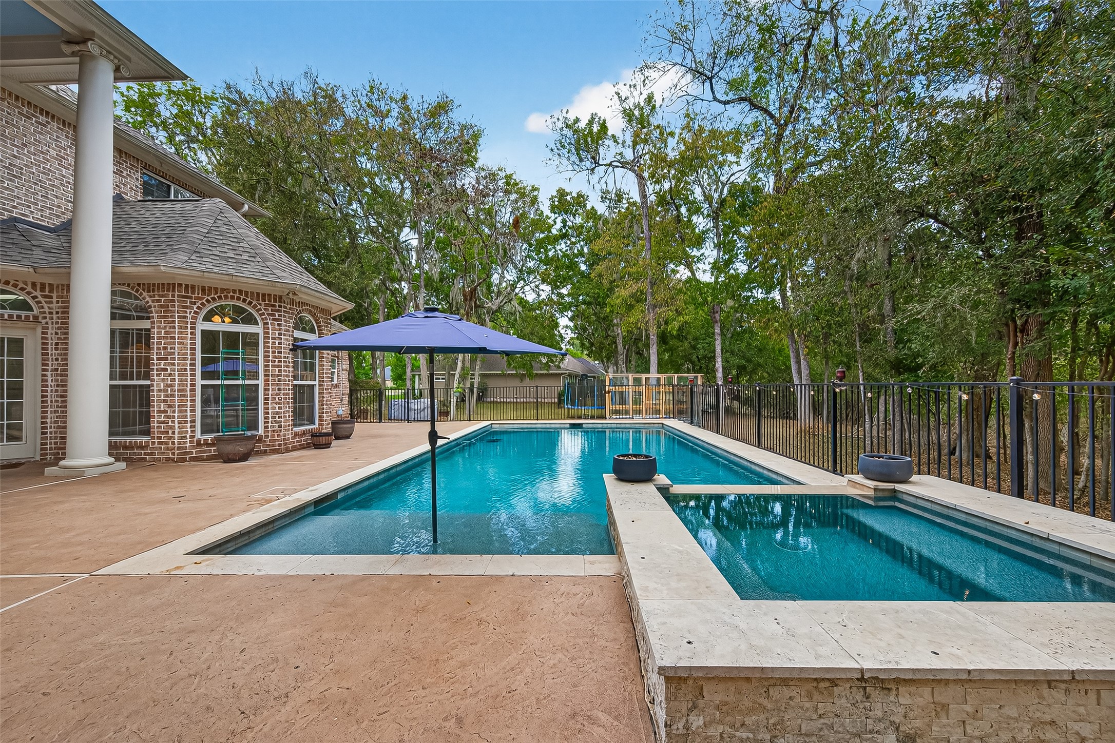 32819 Whitburn Trail Fulshear, TX 77441 - Photo 32 of 49 swimming pool view with a seating space