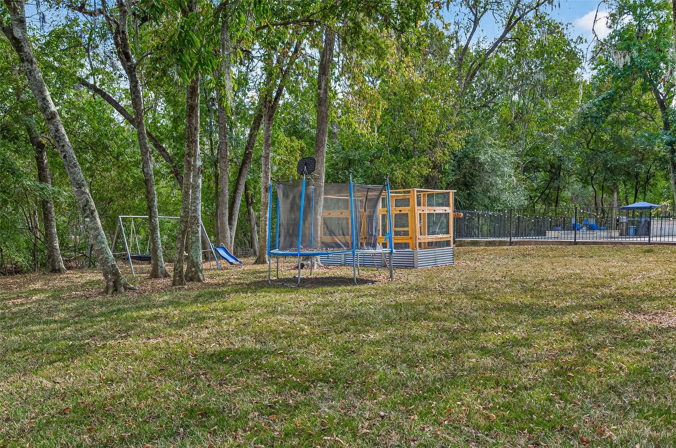32819 Whitburn Trail Fulshear, TX 77441 - Photo 35 of 49 a view of a house with backyard and a tree