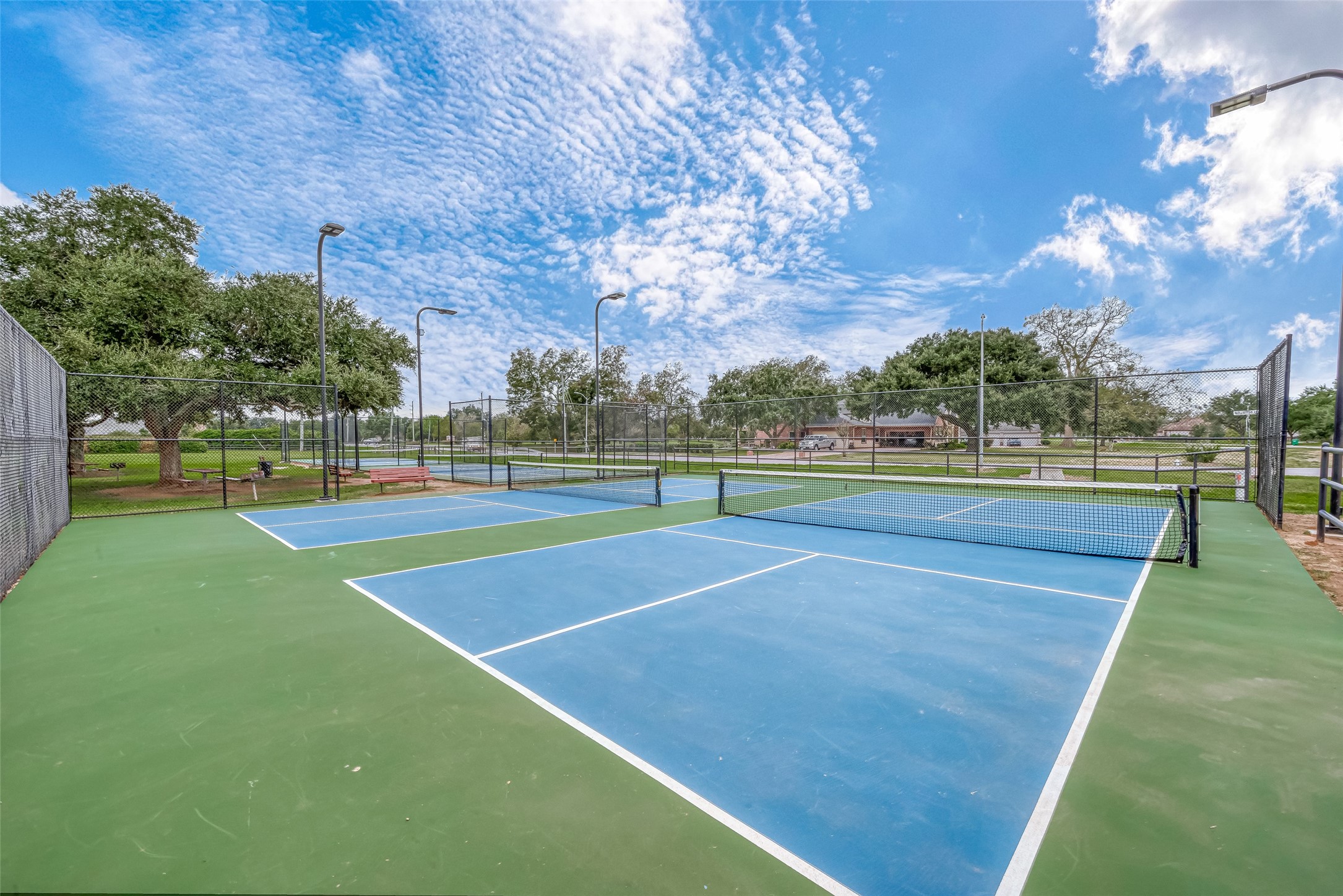 32819 Whitburn Trail Fulshear, TX 77441 - Photo 45 of 49 a view of a tennis court