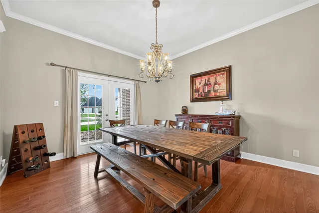 a room with furniture and a chandelier