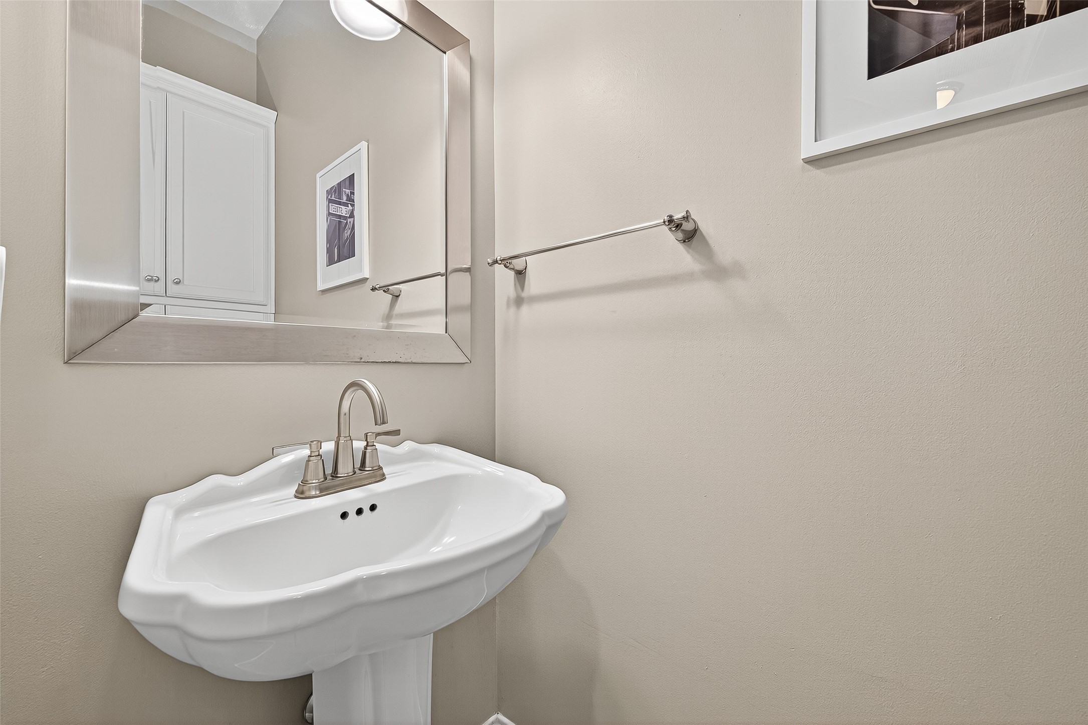 32819 Whitburn Trail Fulshear, TX 77441 - Photo 8 of 49 a bathroom with a sink and a mirror