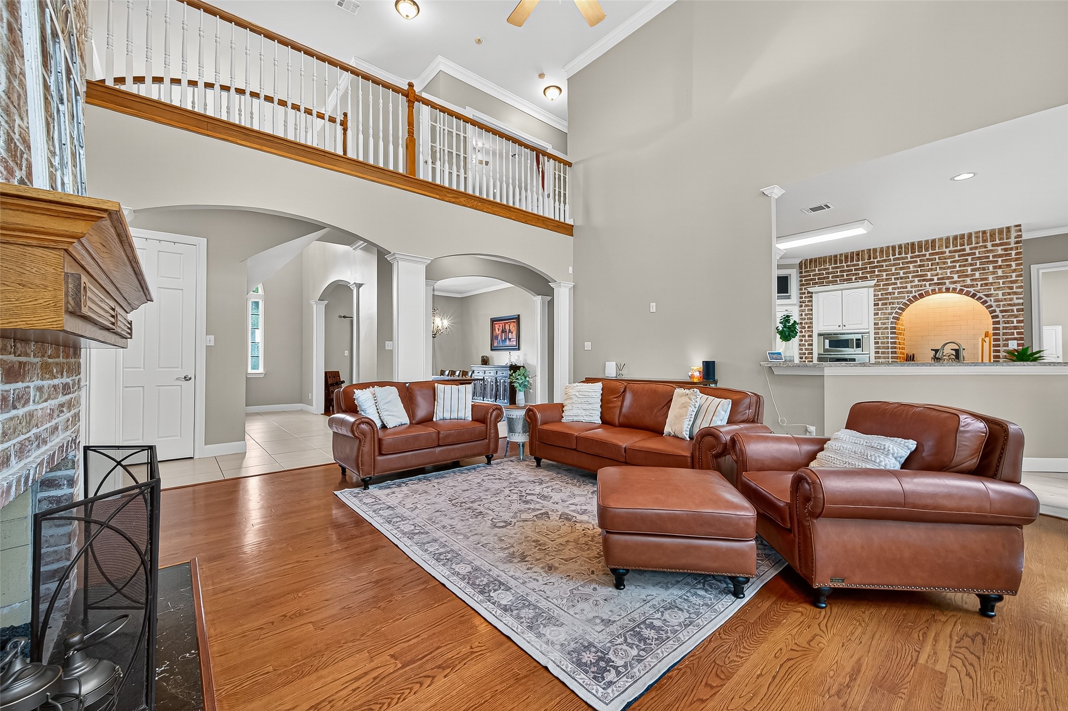 32819 Whitburn Trail Fulshear, TX 77441 - Photo 9 of 49 a living room with furniture and wooden floor