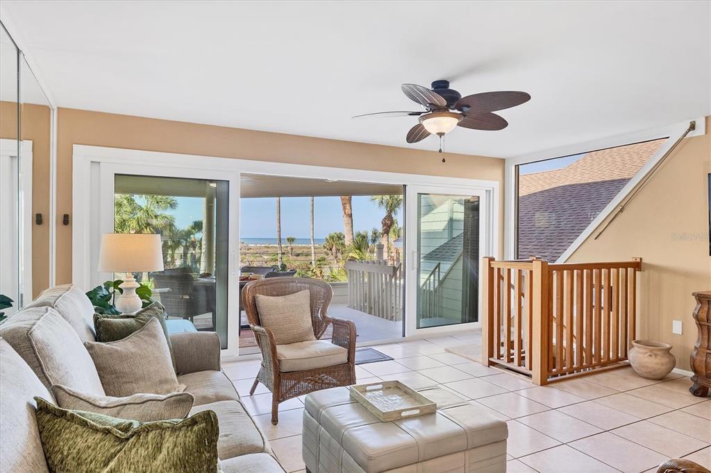 540 Beach Road, Unit 510 Sarasota, FL 34242 - Photo 15 of 96 a dining room with furniture and a floor to ceiling window