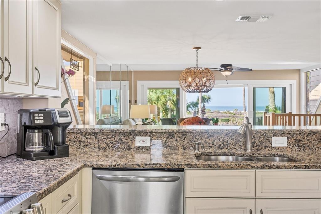 540 Beach Road, Unit 510 Sarasota, FL 34242 - Photo 21 of 96 a kitchen with stainless steel appliances granite countertop a sink and a granite counter tops