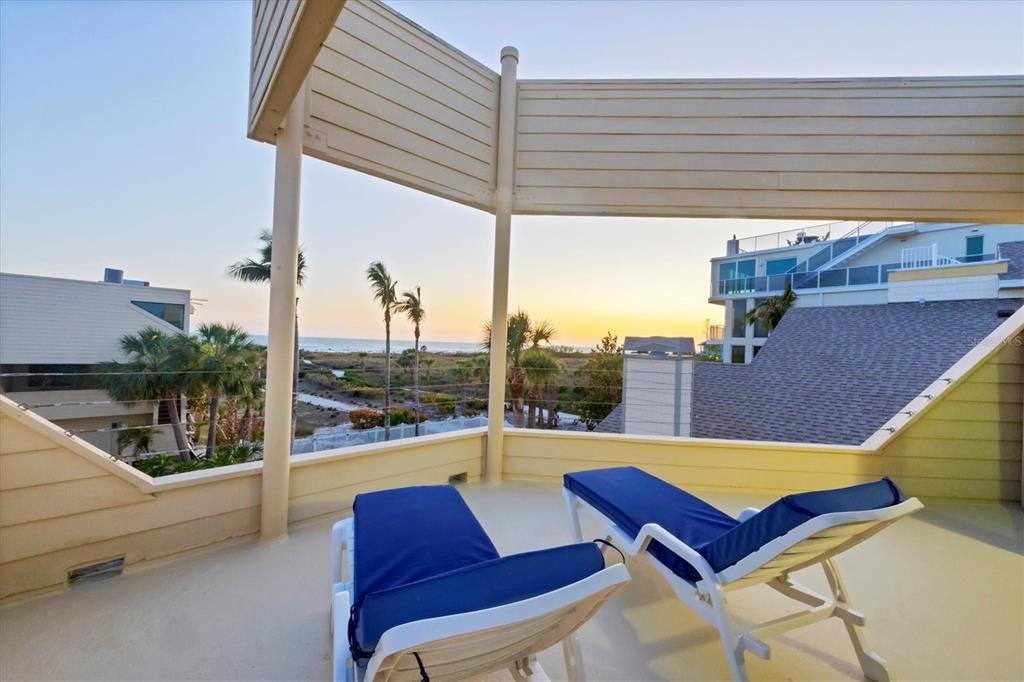540 Beach Road, Unit 510 Sarasota, FL 34242 - Photo 38 of 96 a view of a swimming pool with a lounge chairs