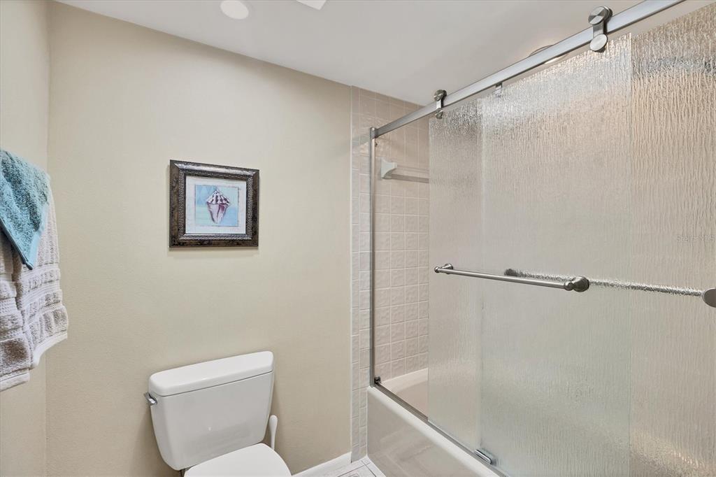 540 Beach Road, Unit 510 Sarasota, FL 34242 - Photo 45 of 96 a bathroom with a shower and toilet