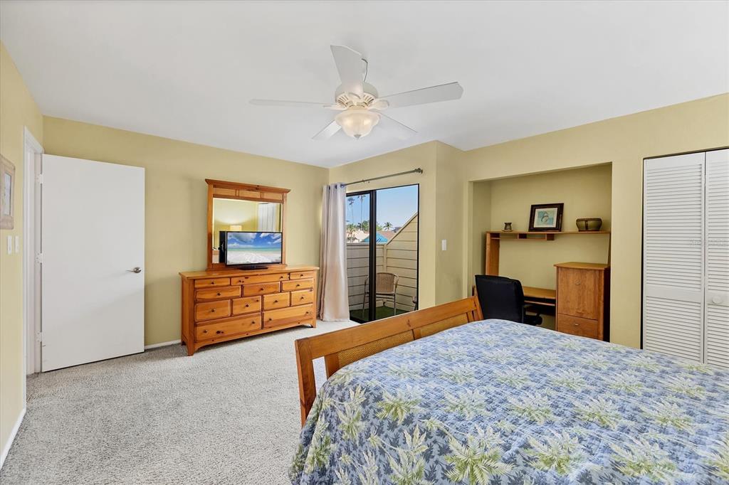 540 Beach Road, Unit 510 Sarasota, FL 34242 - Photo 48 of 96 a bedroom with a bed and a dresser