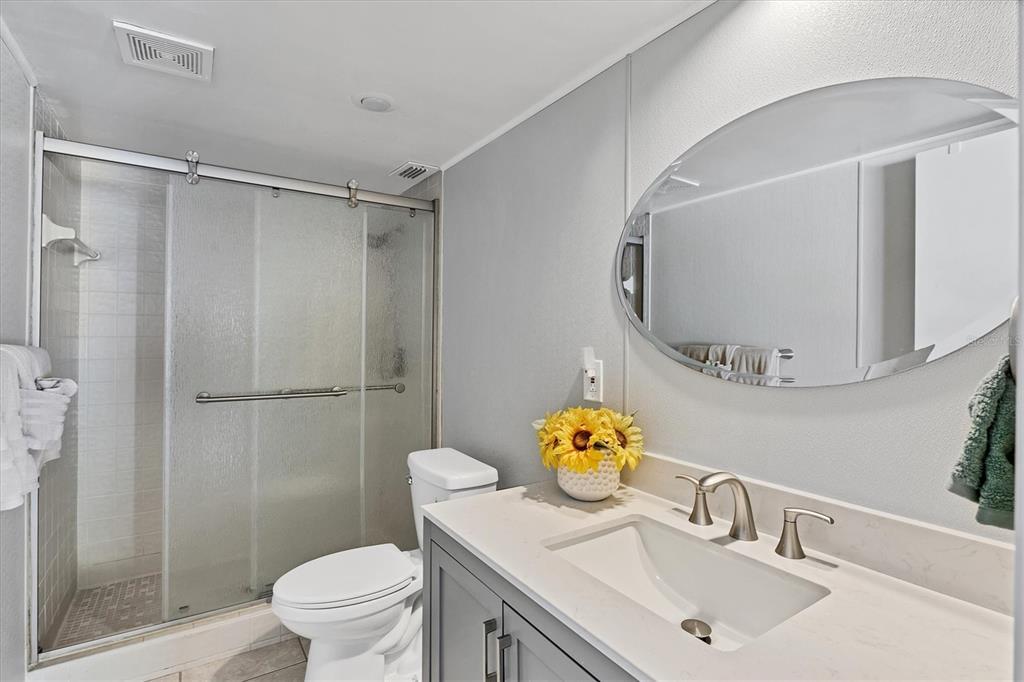 540 Beach Road, Unit 510 Sarasota, FL 34242 - Photo 52 of 96 a bathroom with a sink toilet and mirror