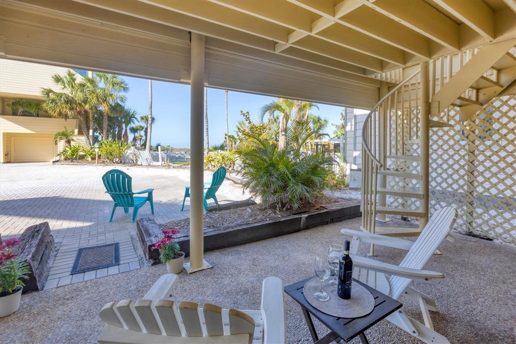 540 Beach Road, Unit 510 Sarasota, FL 34242 - Photo 56 of 96 a outdoor living space with furniture and a potted plant