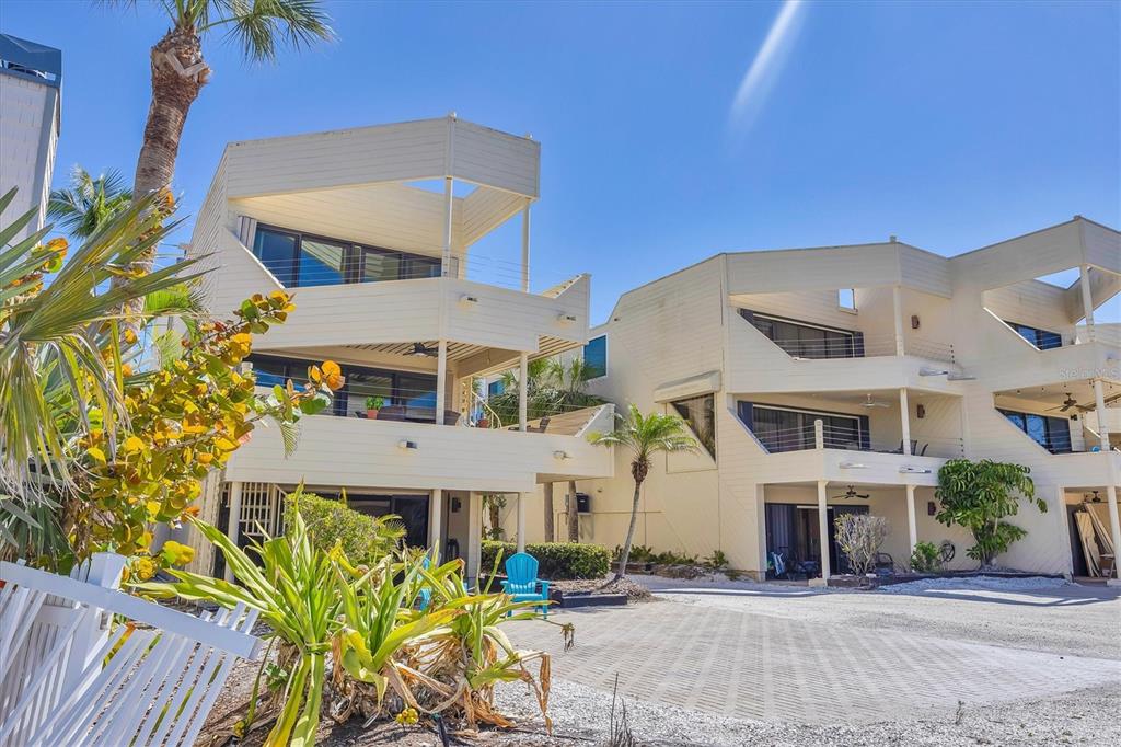 540 Beach Road, Unit 510 Sarasota, FL 34242 - Photo 61 of 96 front view of a building with a street