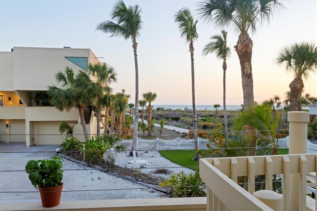 540 Beach Road, Unit 510 Sarasota, FL 34242 - Photo 7 of 96 a view of a terrace with palm trees