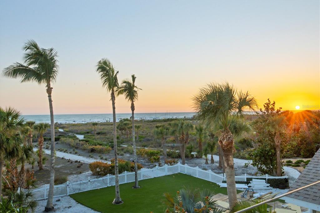 540 Beach Road, Unit 510 Sarasota, FL 34242 - Photo 8 of 96 a view of a swimming pool with a yard