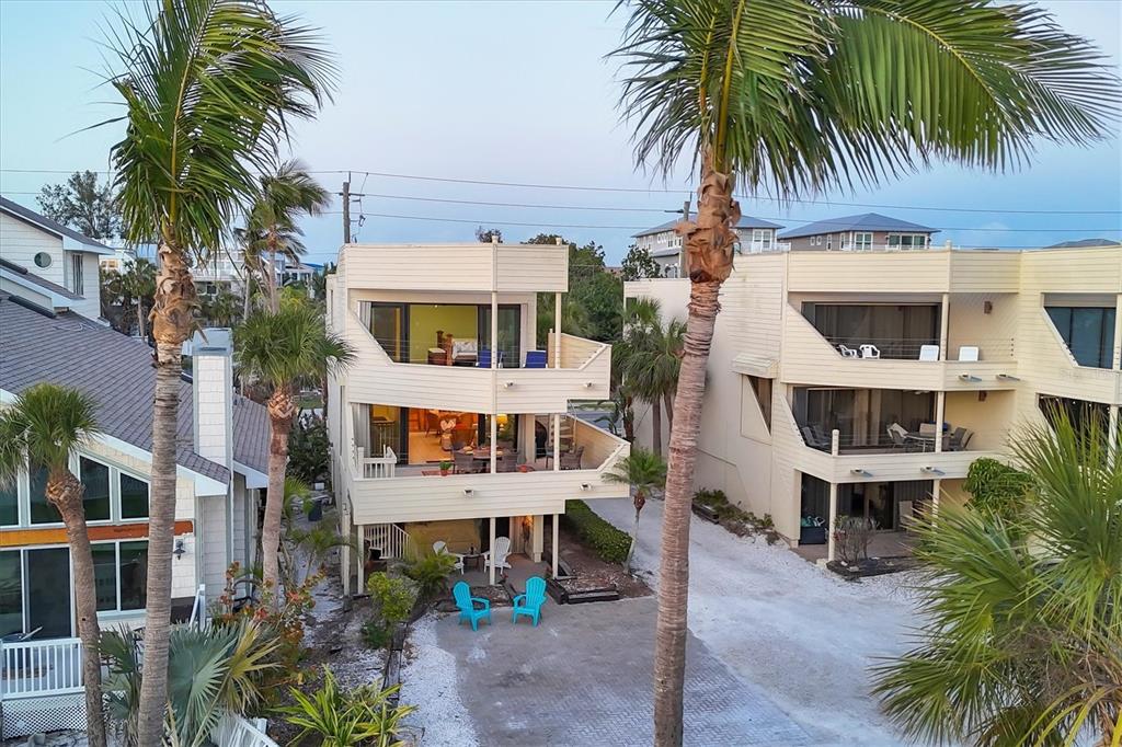 540 Beach Road, Unit 510 Sarasota, FL 34242 - Photo 9 of 96 a front view of residential houses with yard and entryway