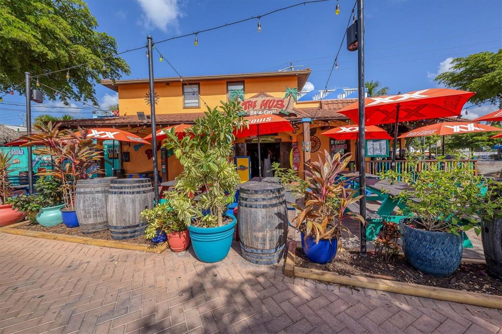 540 Beach Road, Unit 510 Sarasota, FL 34242 - Photo 92 of 96 a view of a chairs and tables in patio
