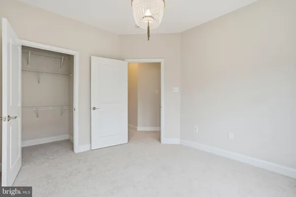 an empty room with a bathroom