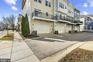 a front view of a building with a street