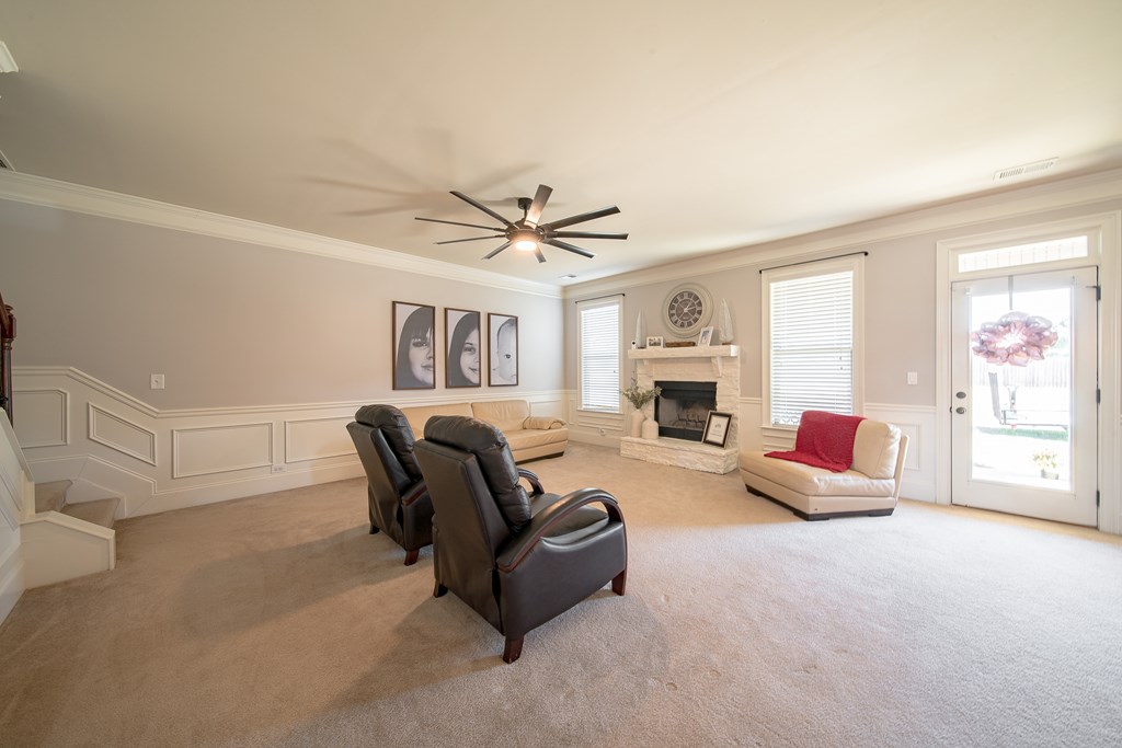 33 Utah Street Fort Mitchell, AL 36856 - Photo 19 of 49 a living room with furniture and a fireplace