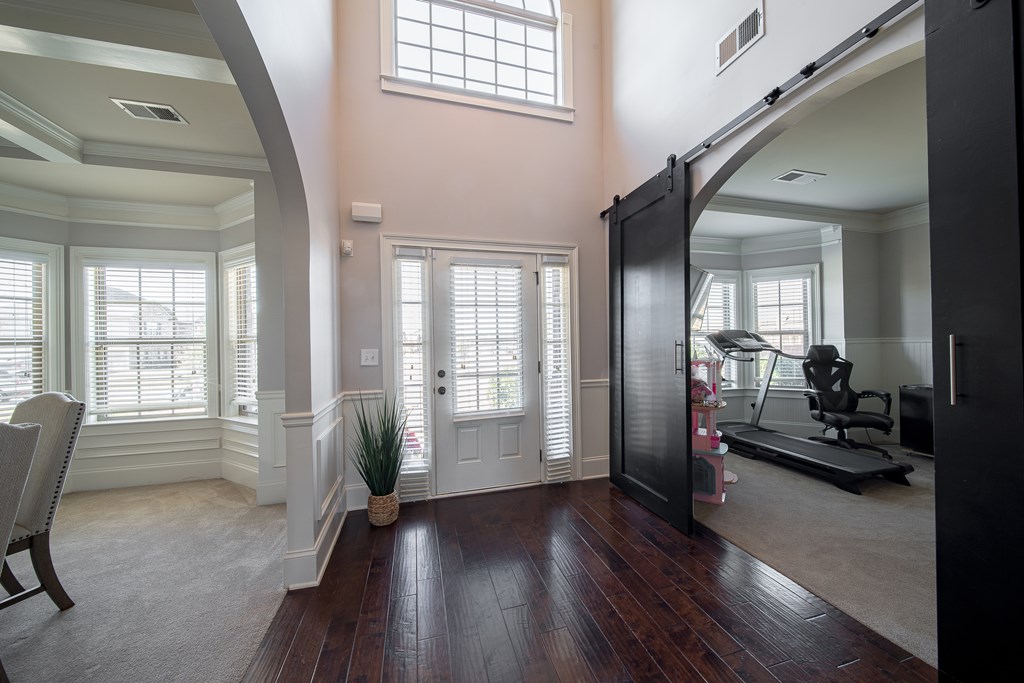 33 Utah Street Fort Mitchell, AL 36856 - Photo 2 of 49 a view of a livingroom with furniture hardwood floor and a large window