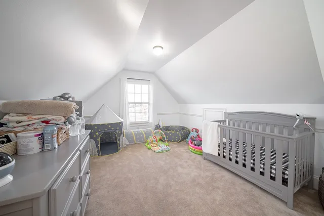 a spacious bathroom with a double vanity sink mirror and shower