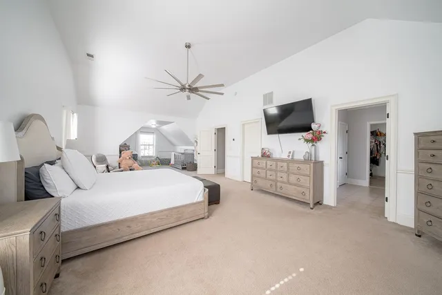 a bathroom with a tub and a window