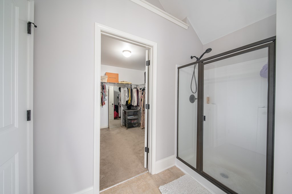 33 Utah Street Fort Mitchell, AL 36856 - Photo 36 of 49 a view of a bathroom with a glass shower door