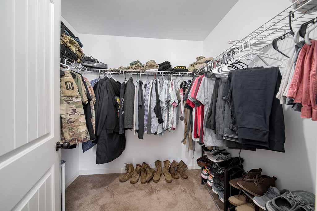 33 Utah Street Fort Mitchell, AL 36856 - Photo 40 of 49 a view of walk in closet with clothes and shoes