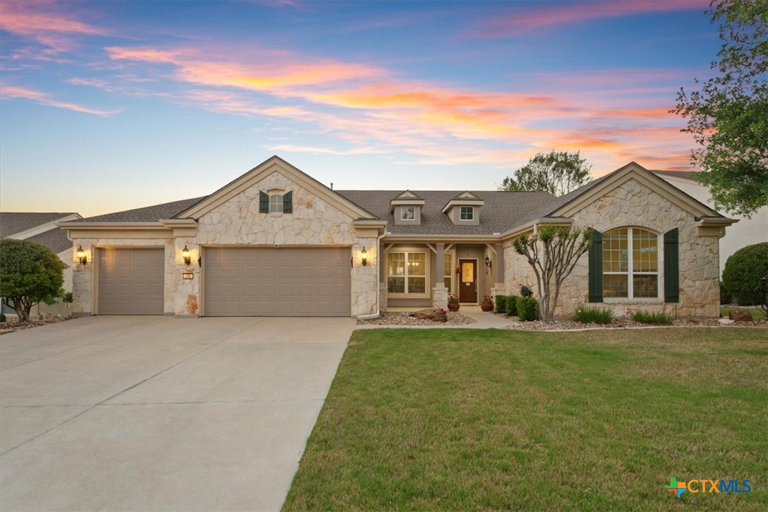 front view of a house with a yard