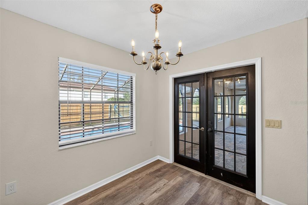 12435 Lola Drive Spring Hill, FL 34608 - Photo 17 of 63 a view of an empty room with a window