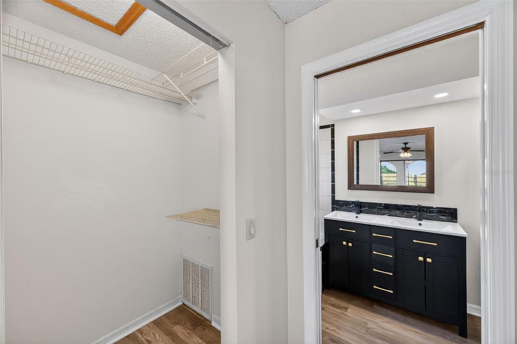 12435 Lola Drive Spring Hill, FL 34608 - Photo 25 of 63 a view of a hallway with washer and dryer