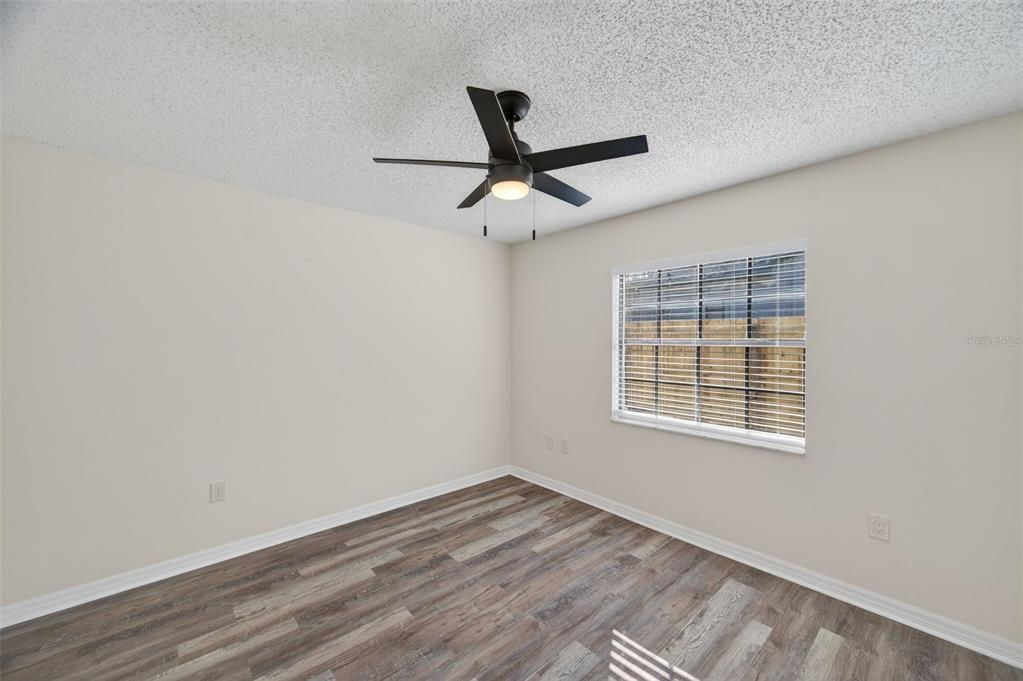 12435 Lola Drive Spring Hill, FL 34608 - Photo 34 of 63 a view of an empty room with a window