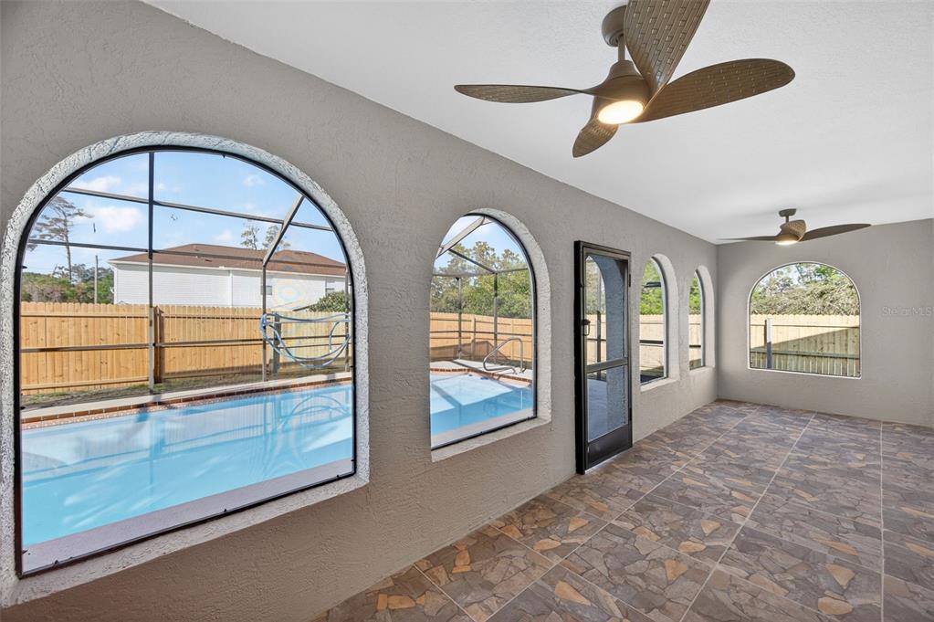 12435 Lola Drive Spring Hill, FL 34608 - Photo 47 of 63 a view of an empty room with a window